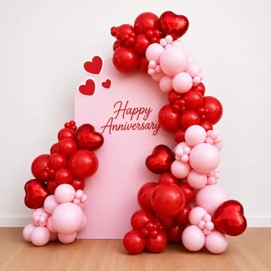 Romantic Anniversary Backdrop with Red and Pink Balloon Arch — decoration setup in Pune